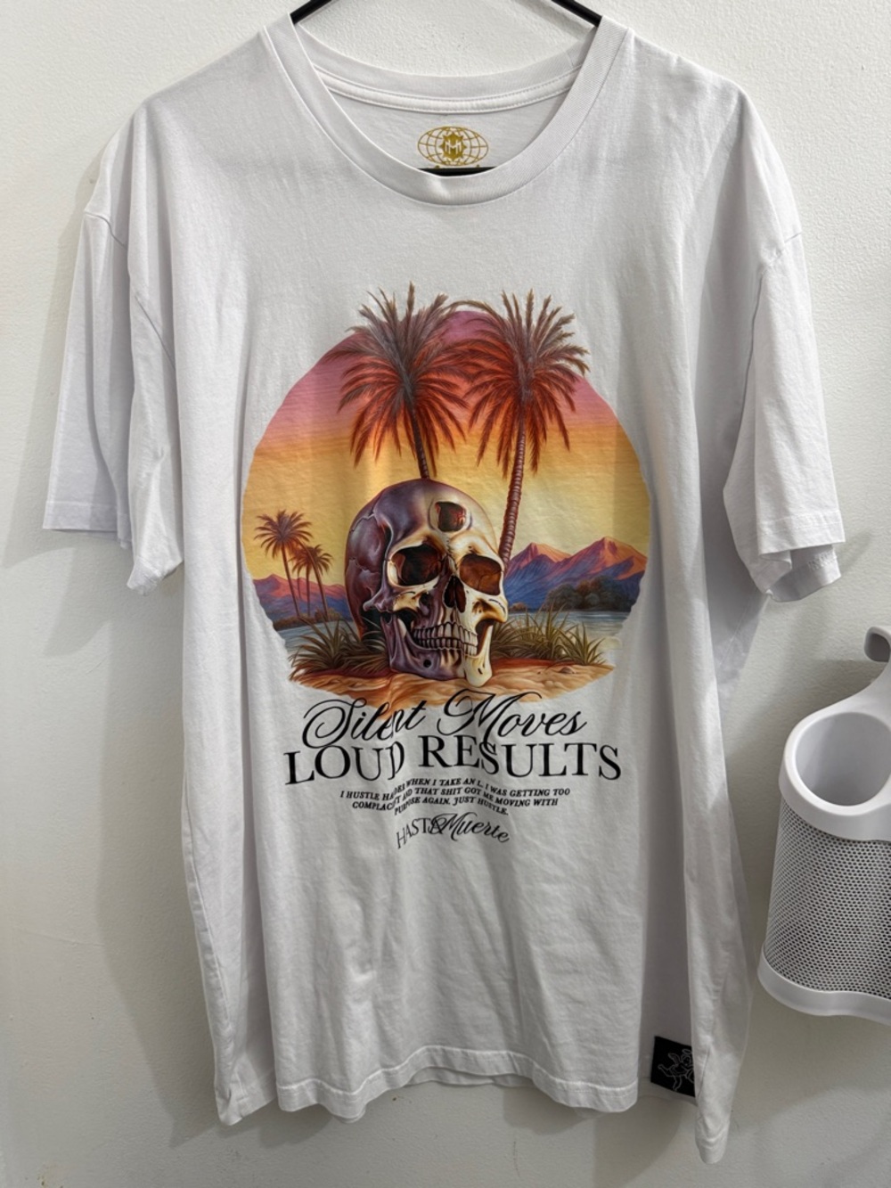 Hasta Muerte White Graphic Tee with Sunset Skull and Palm Trees - Silent Moves